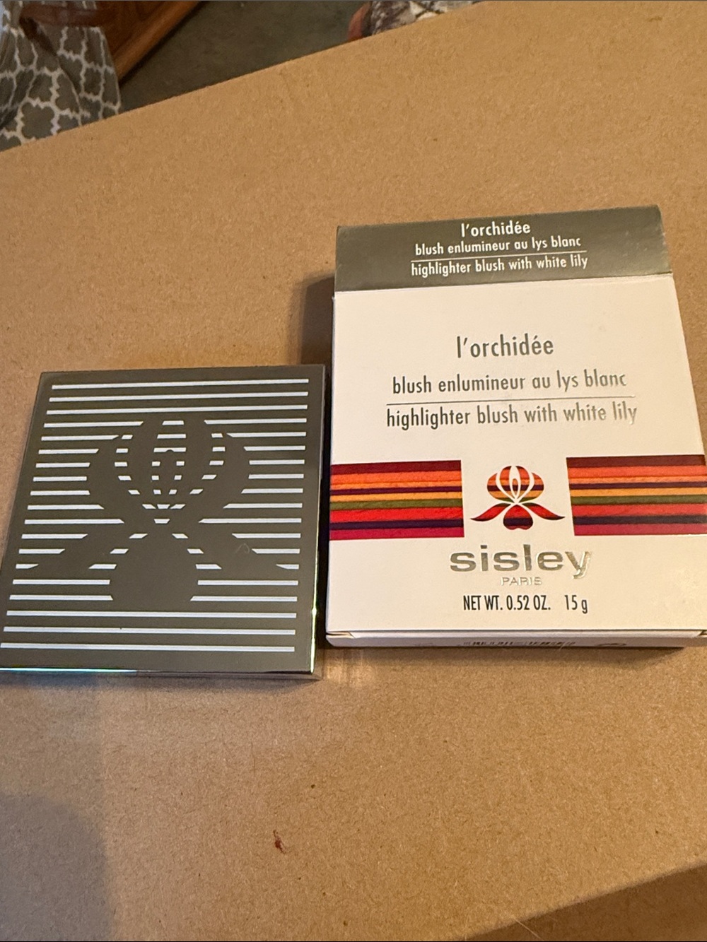 Sisley l'orchidée Highlighter Blush - Silver & White Packaging